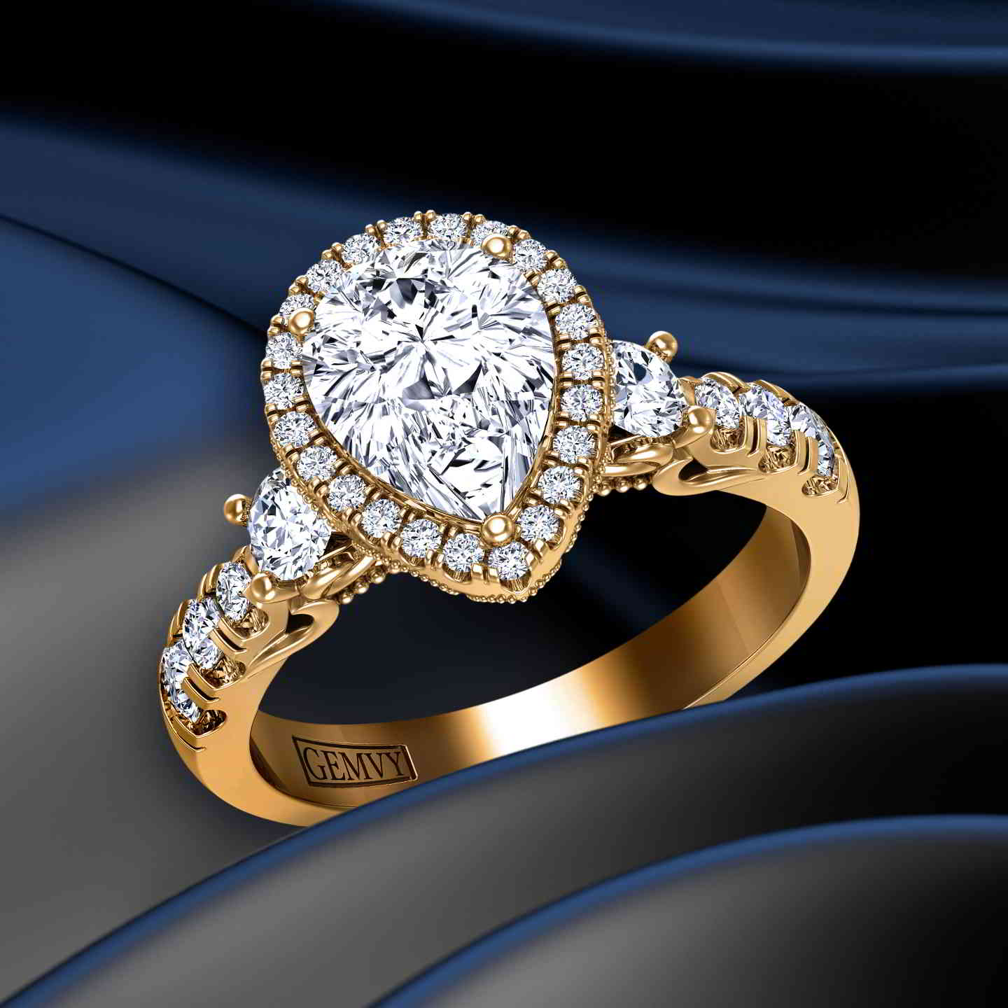 A pear-cut halo diamond and white gold engagement ring.