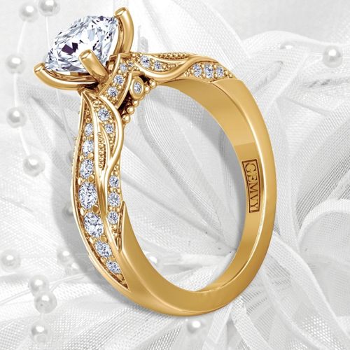 Yellow gold Edwardian style engagement ring with filigree
